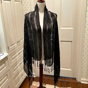BLACK SHEER, GOSSAMER-LIKE SHAWL WITH WOVEN GOLD THREADS AND BLACK FRINGE